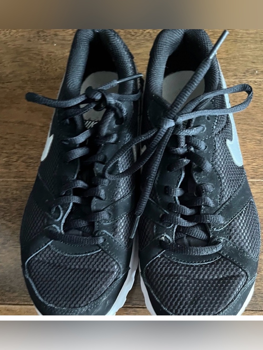 Nike Air Black Mesh Athletic Sneakers with White Swoosh Accent